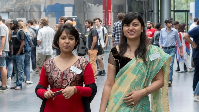 Two CIT students from India wearing traditional clothing.