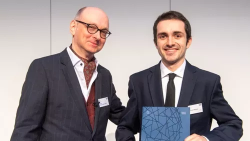 Prof. Folkmar Bornemann, Dean of the Department of Mathematics, and Johannes Bäumler (from left) at the graduation ceremony 2019.