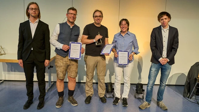 Prof. Mathias Drton, Prof. Christina Kuttler, and Prof. Christian Liedtke receive the Golden Compass in the category "Best Advanced Lecture".